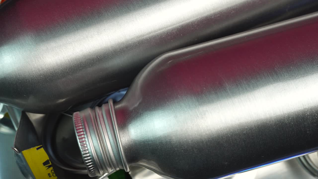 New Aluminum Bottles Above Used Cans, Aluminium Recycling