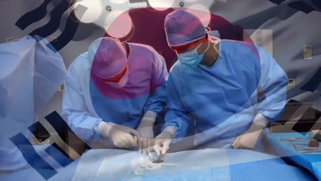 Animation-of-flag-of-south-korea-waving-over-surgeons-in-operating-theatre