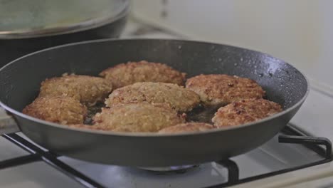 frying home made pork beef chops from ground meat