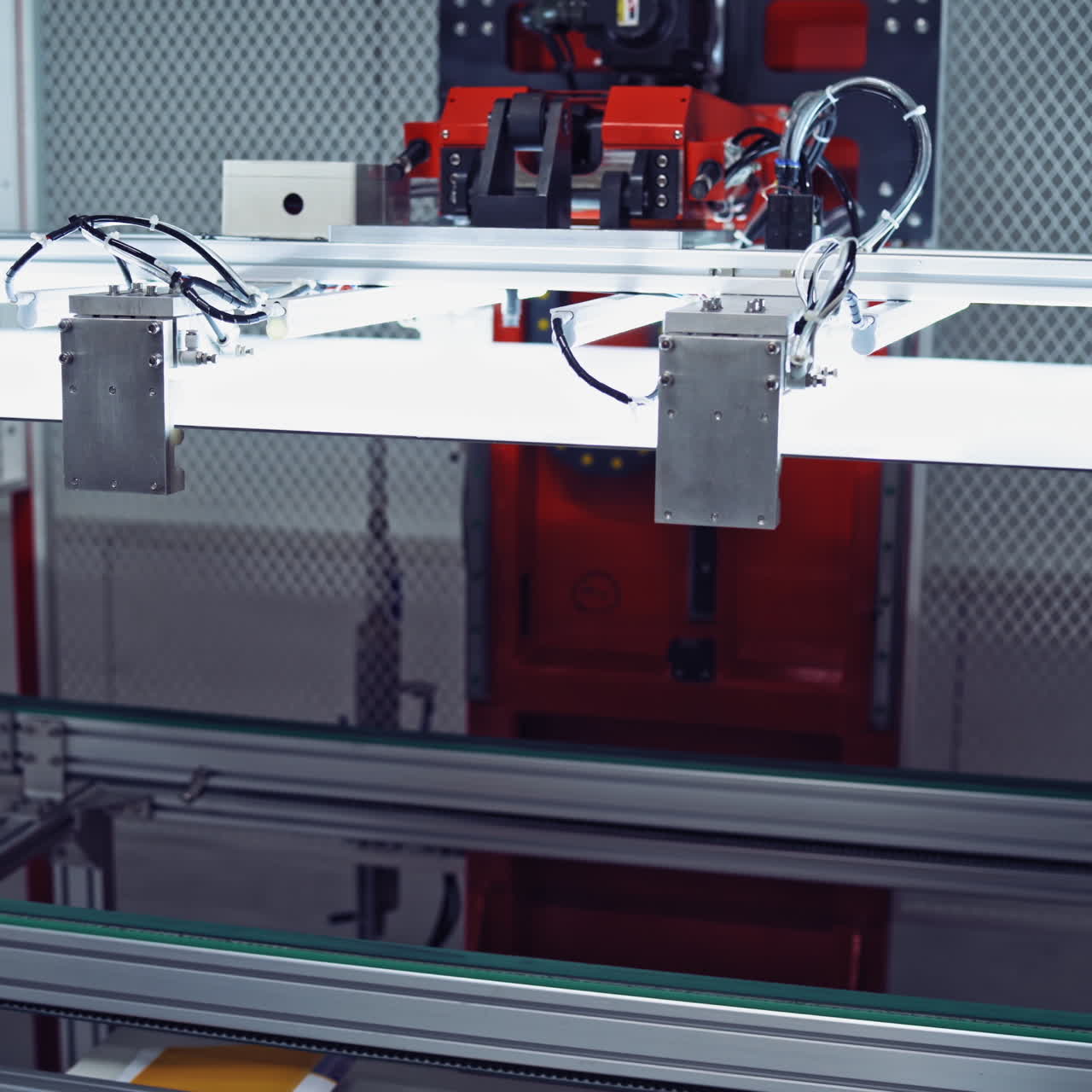 Production of new solar panels. Automated equipment inside the modern robotic manufacturing. Innovative factory indoors.