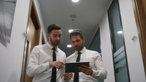 Two managers talking