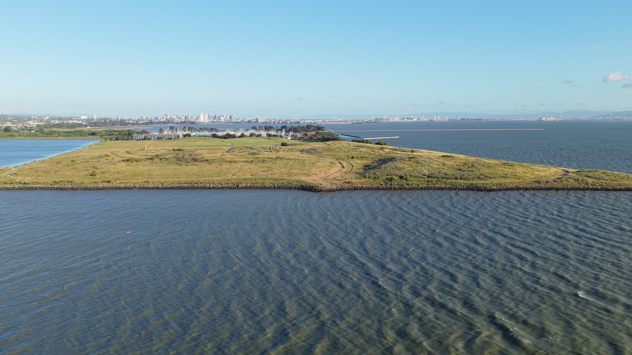 Drone captures the balance of green space and urban shoreline that defines Cesar Chavez Park’s charm.