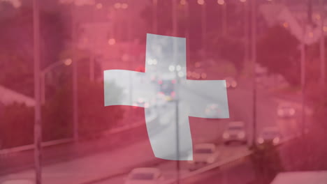 swiss flag overlaying animation of busy highway with blurred cars and streetlights
