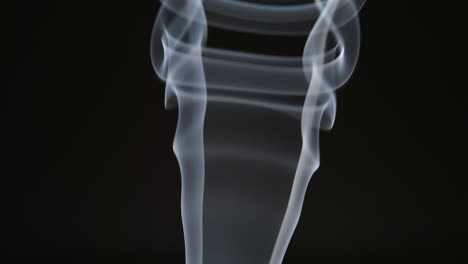 SLOW MOTION: Curve line of smoke on a black background