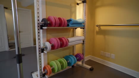 home gym setup with dumbbells and yoga mats