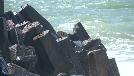 dyke protection with concrete groins, breakers, north sea, denmark, 4k