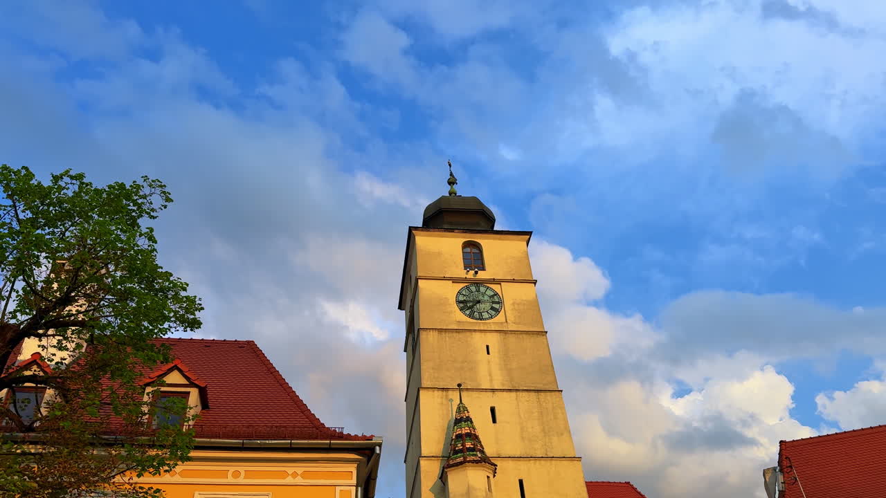 Historic Clock Tower in Sibiu. Old medieval Clock Tower against blue sky in Sibiu, Romania