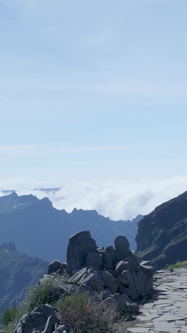 Majestic Mountain Landscape with Sea of Clouds and Stone Path
