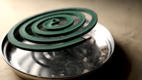 mosquito coil repellent
close up of mosquito coil