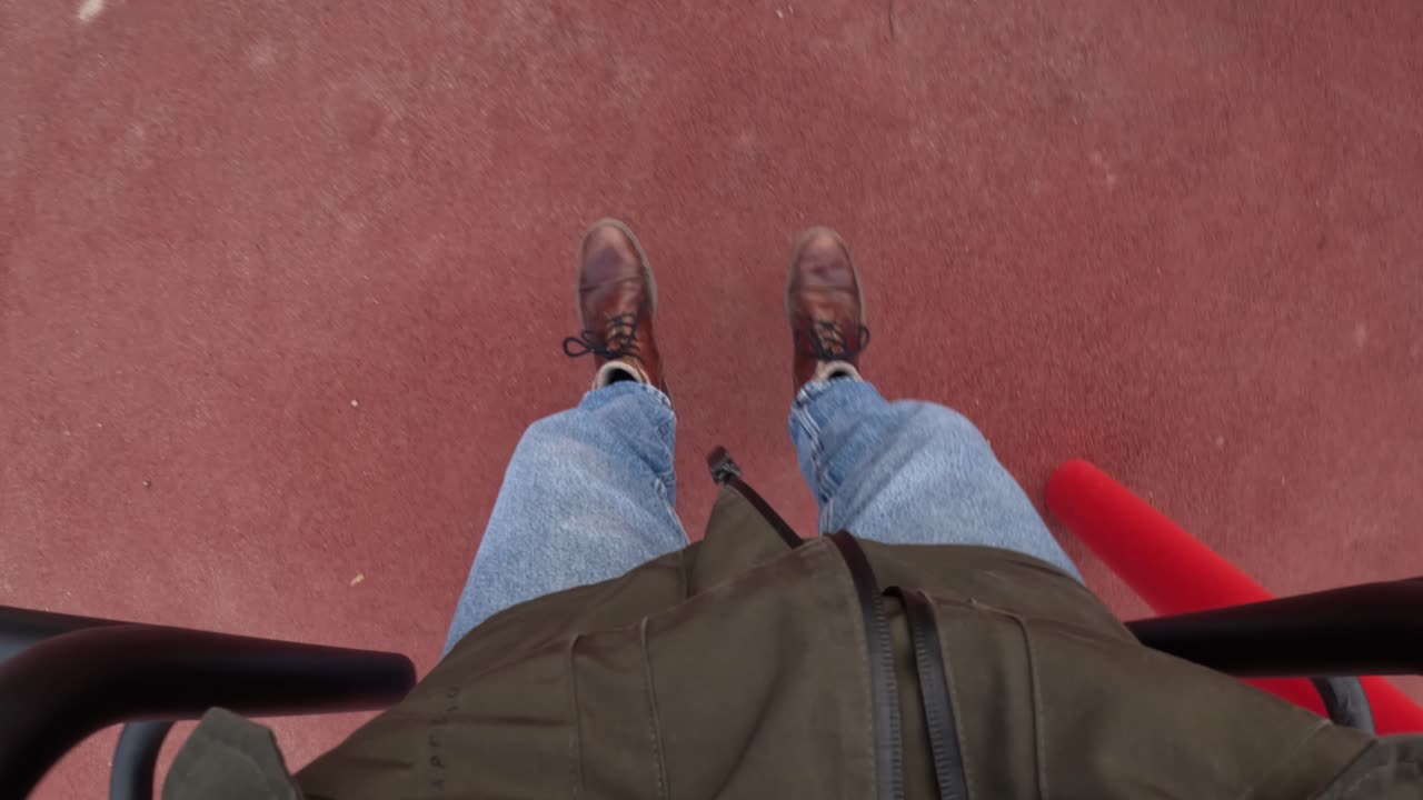 Person Doing Dip Exercise On The Bar In Outdoor Gym. - POV shot