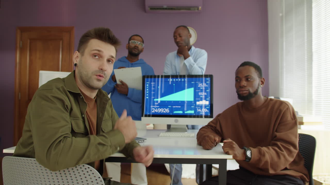 Team of Investors Looking at Trading Screen at Real Time