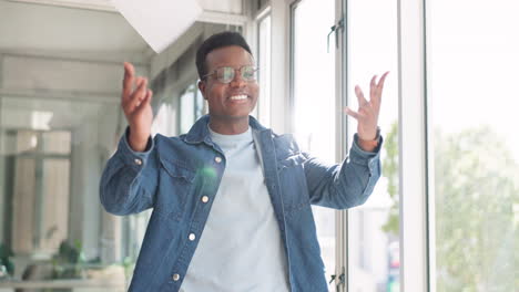 Creative-black-man,-smile-and-throwing-papers