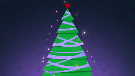 árbol de navidad con estrella roja en la noche