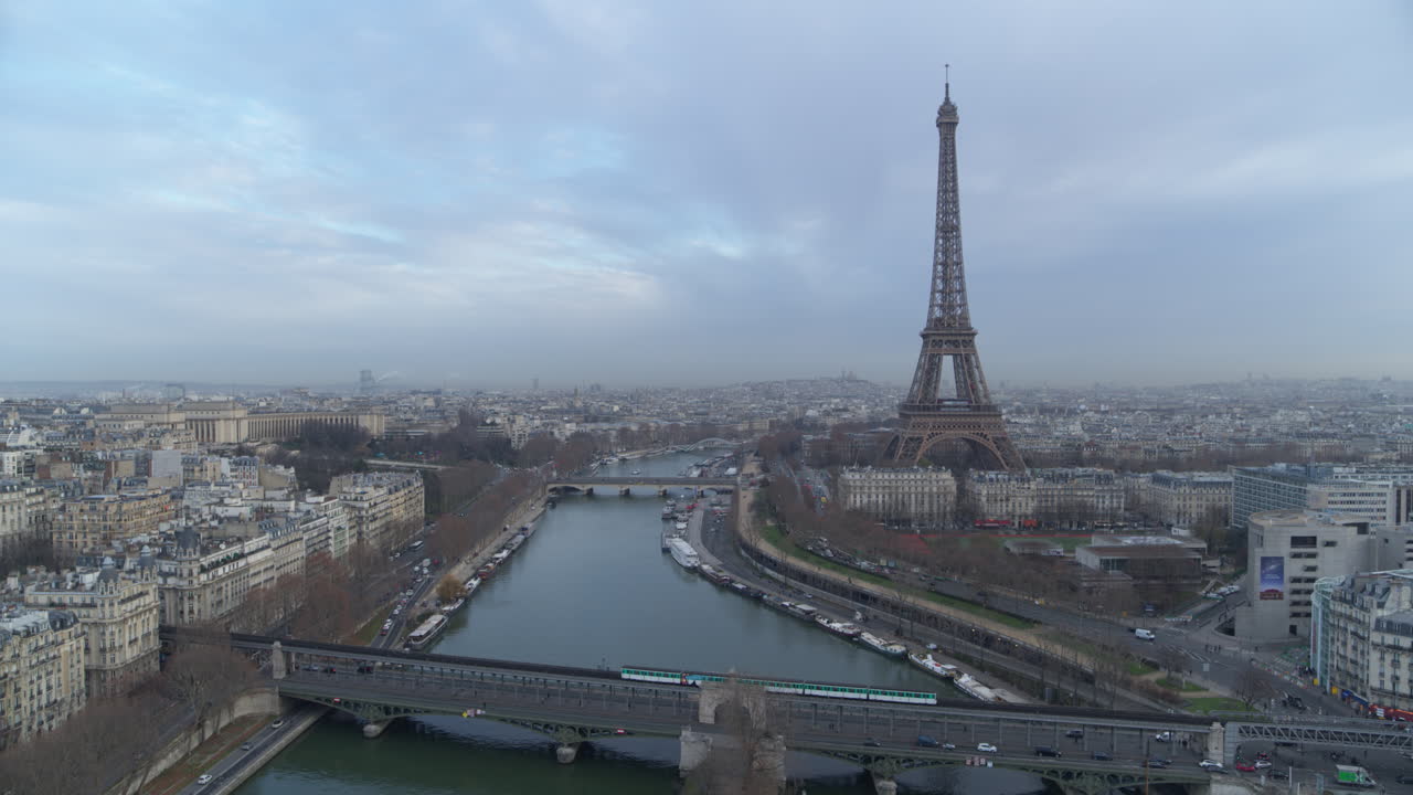 Drone shot of Paris Eiffel Tower with Subway passing by
