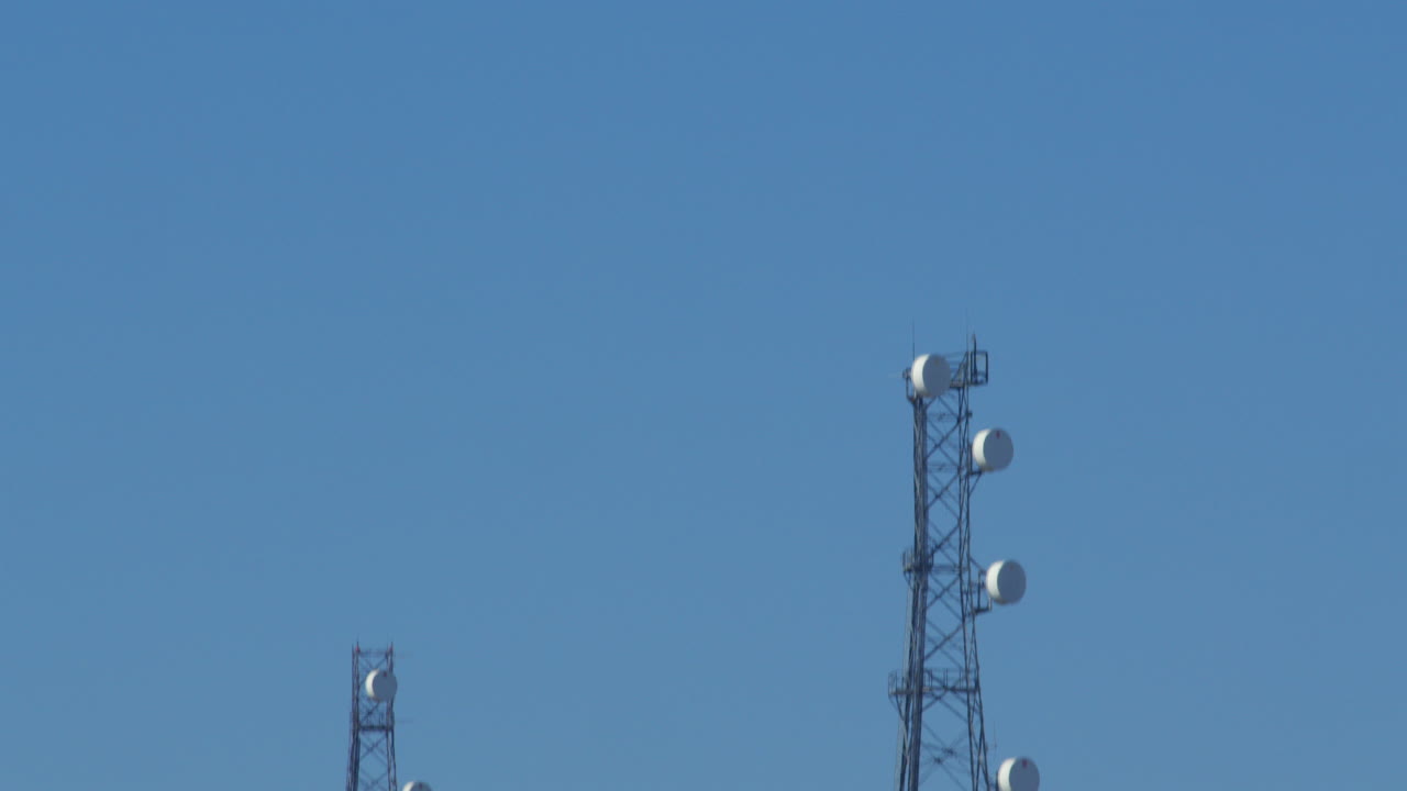 tilting up shot of a communication mast tower at Bacton