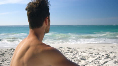 Man-posing-on-the-beach