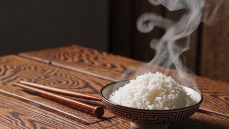 hot bowl of rice with chopsticks