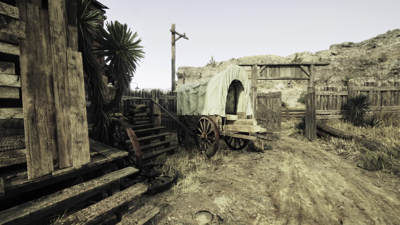 Old western town with rustic wagon and weathered wooden structures