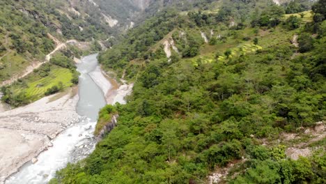 green vegetation at the riverside of marshyangdi river on annapurna trek in nepal