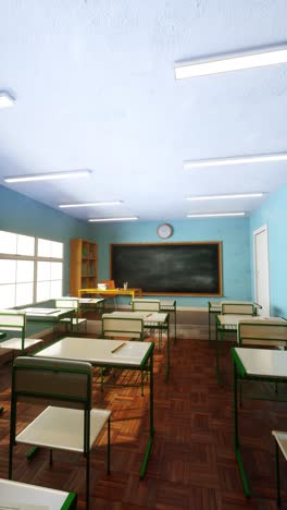 vertical animation. blank blackboard in an empty school classroom. zoom in.