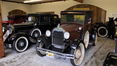 antique car museum at potlatch totem park and museum in ketchikan, alaska.
