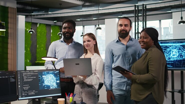 Team Of Programmers In Office Automating Repetitive Tasks Using Ai Scripts