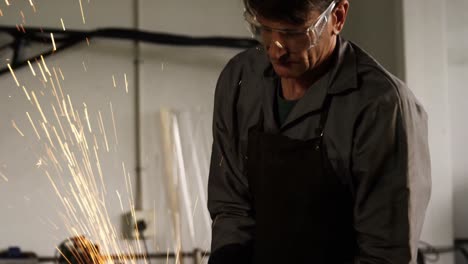 welder working at work shop