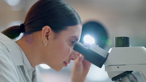 Particles,-microscope-or-woman-scientist