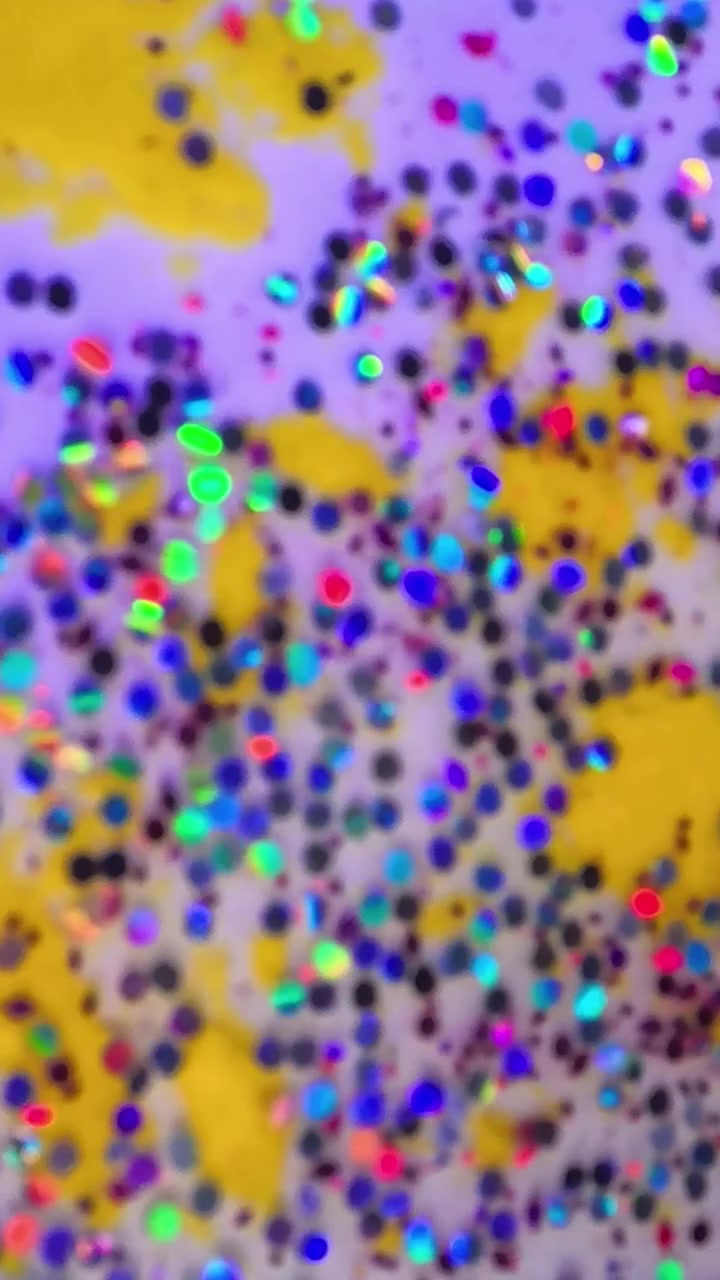 Sfondo con particelle di glitter colorate