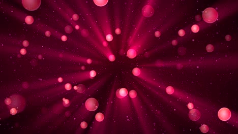 fondo romántico abstracto con partículas de brillo y rayos de luz. bucle sin costuras.