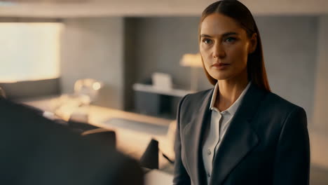 a confident businesswoman in a suit in an office setting