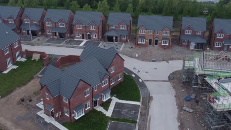 new property incomplete neighbourhood housing construction site aerial view