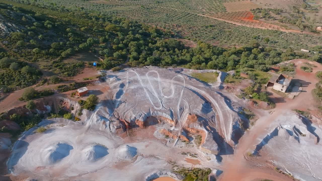The landscape is Dehesa Extremeña. In clip also appear a motorbike circuit in an old mine.