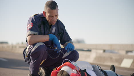 paramedic man, street and patient on stretcher