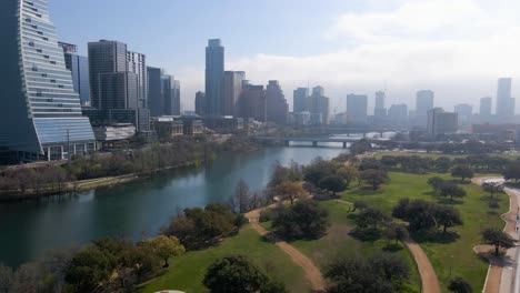 a sweeping aerial view of the city's bustling business district, showcasing its impressive commercial buildings and lively streets