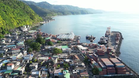 anjouan island located in the indian ocean, part of the comoros archipelago aerial footage of main commercial port with scenic seascape coastline at distance