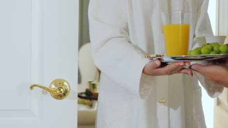 The-Waiter-Delivered-Breakfast-To-The-Hotel-Room-On-A-Tray-Juice-And-Fruit