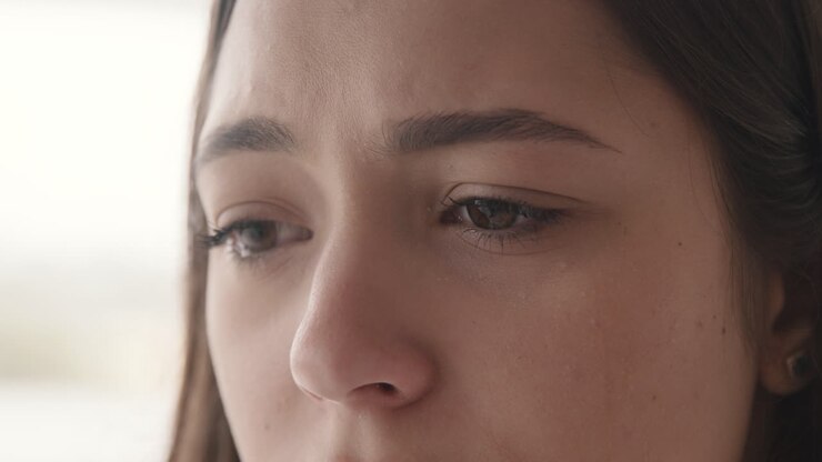 Close Up Of Face Of Unhappy Woman Crying