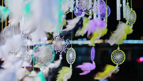 wind blowing through a willow hoop in a shop in hoi an, vietnam