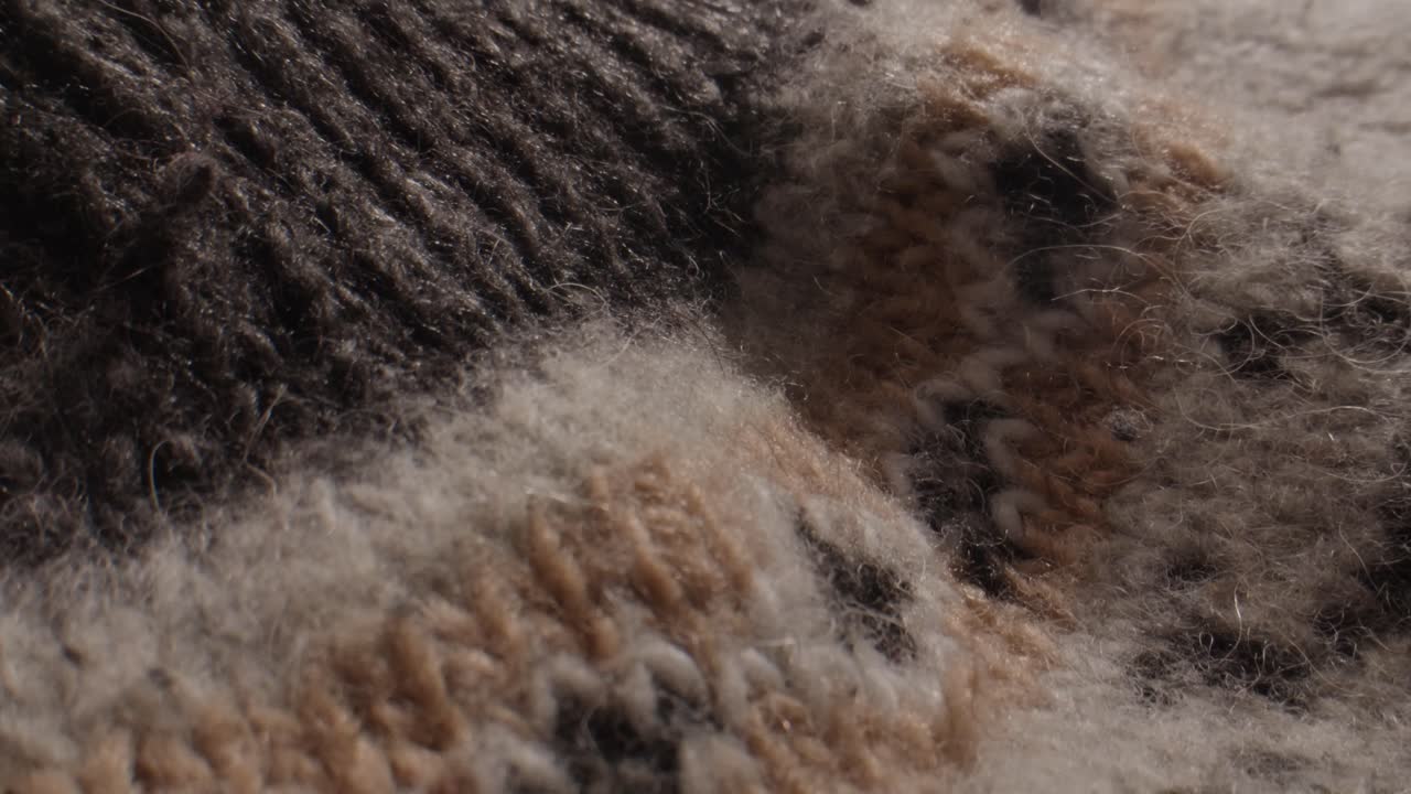 Macro Close-up of Knitted Wool Fabric Texture