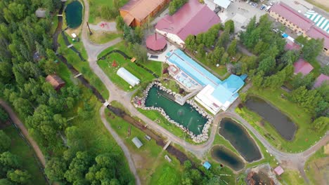 4K-Drone-Video-of-Hot-Spring-Pools-at-Chena-Hot-Springs-Resort-near-Fairbanks,-Alaska-during-Summer