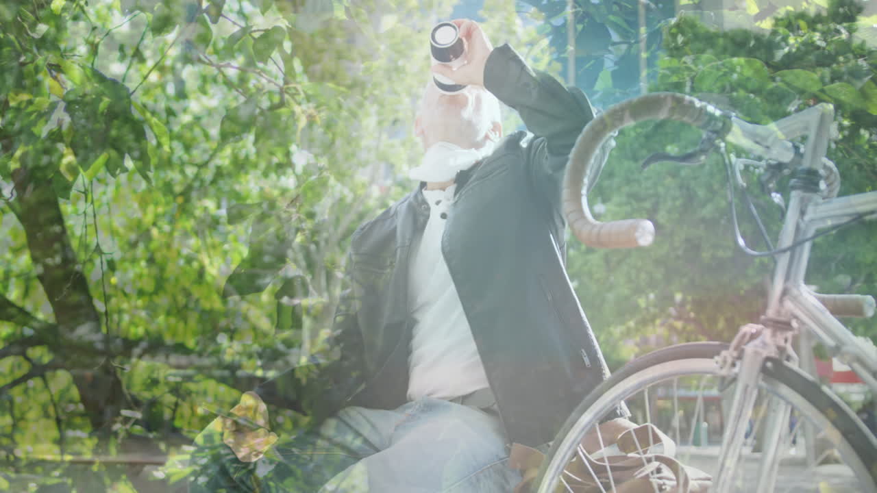 커피를 마시는 백인 남성 위에 잎의 애니메이션