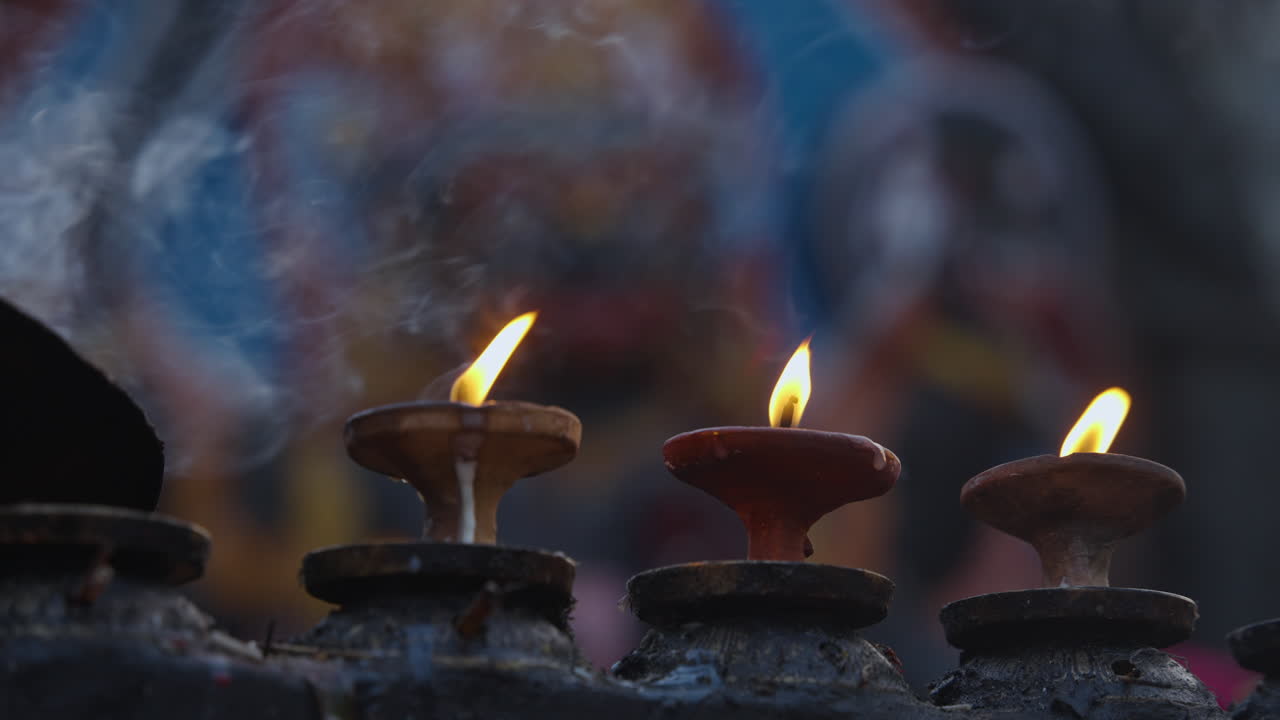 Kali Statue at Basantapur Durbar Square, Kathmandu. Incense smoke and glowing lamps create a ray of hope for Nepal, reflecting spirituality, devotion, and cultural strength for a better future