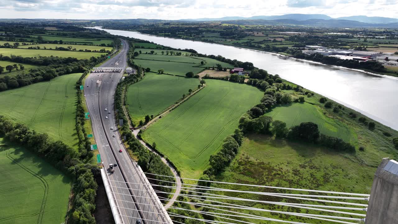 View from high above The Thomas Francis Meagher Bridge over The River Suir at Waterford traffic approaching toal collection Ireland Epic Locations