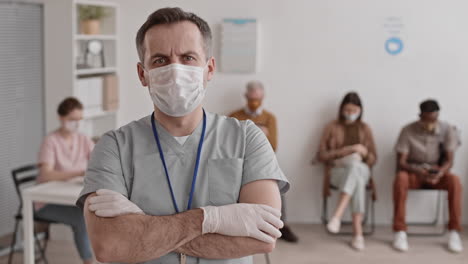 portrait of caucasian male doctor frowning