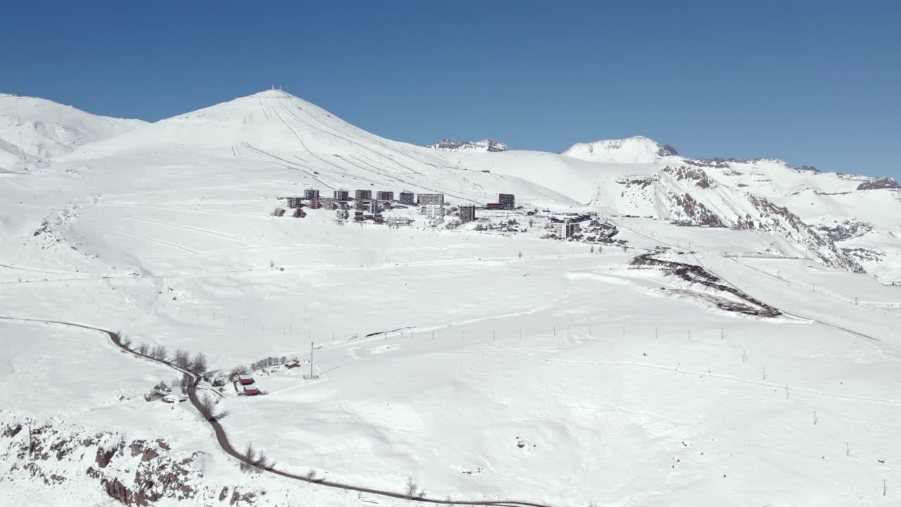 Drone shot establishing the exclusive ski resort El Colorado, in Chile