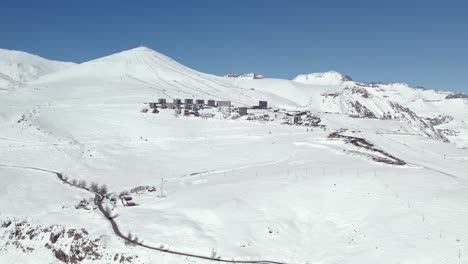 drone shot establishing the exclusive ski resort el colorado, in chile