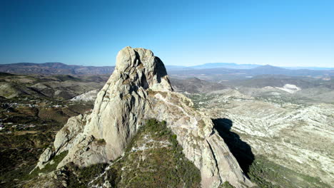 drone shot of entire mountain of bernal in mexico