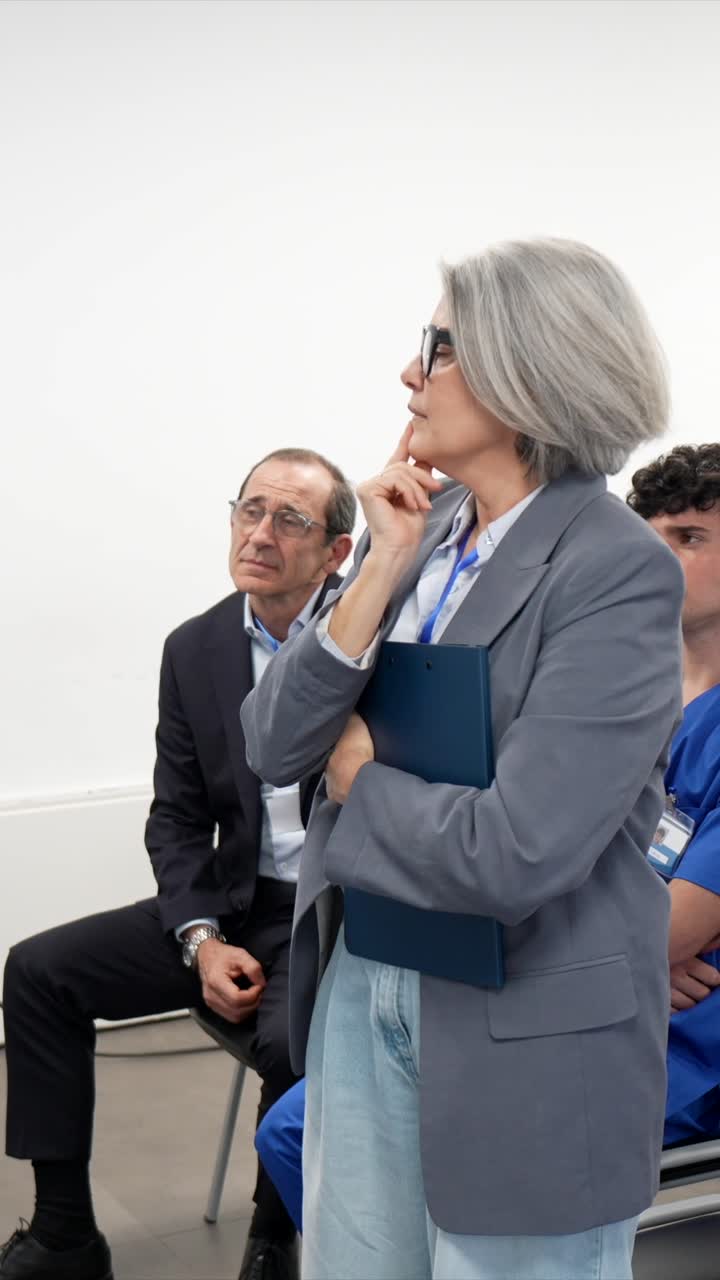 Professional Woman Leading a Discussion in a Seminar