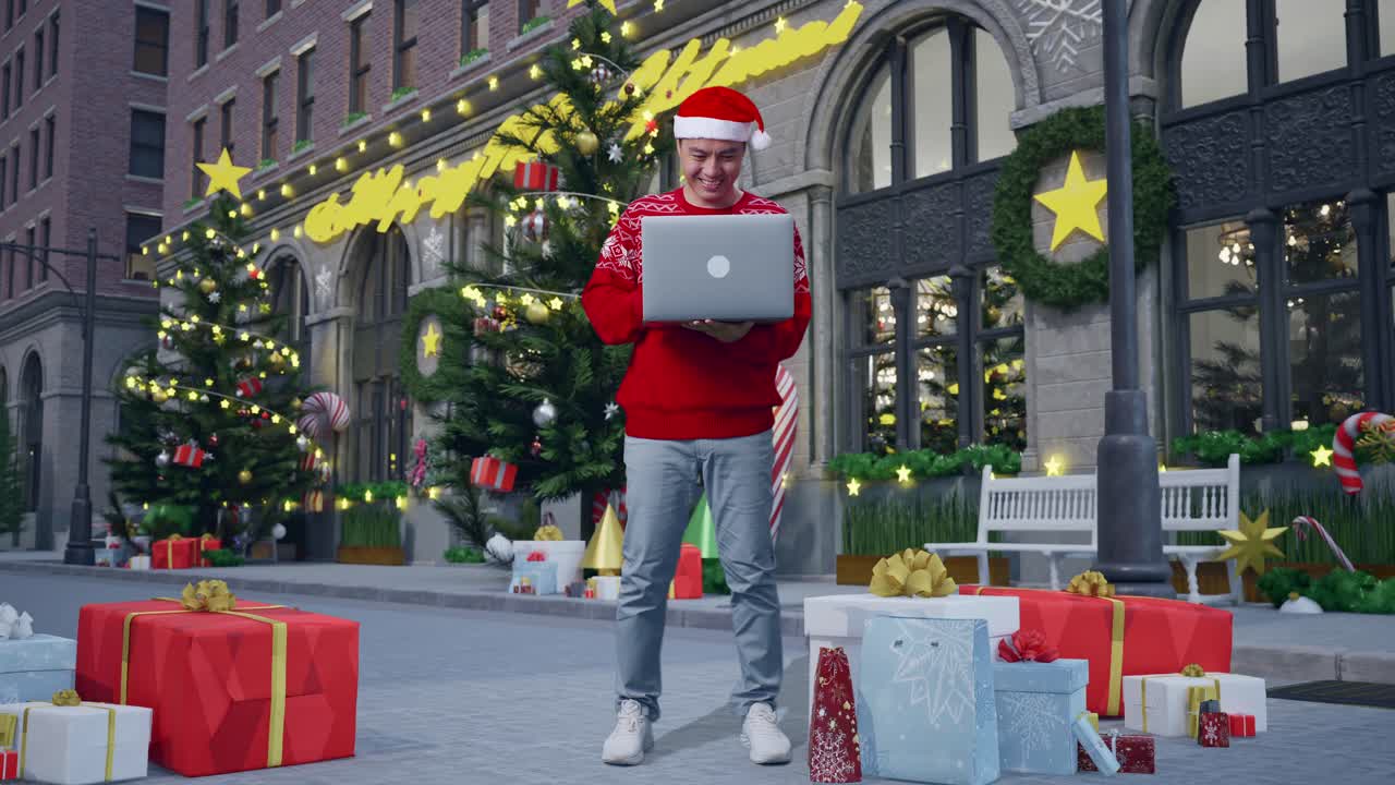 hombre usando una computadora portátil en la calle de navidad